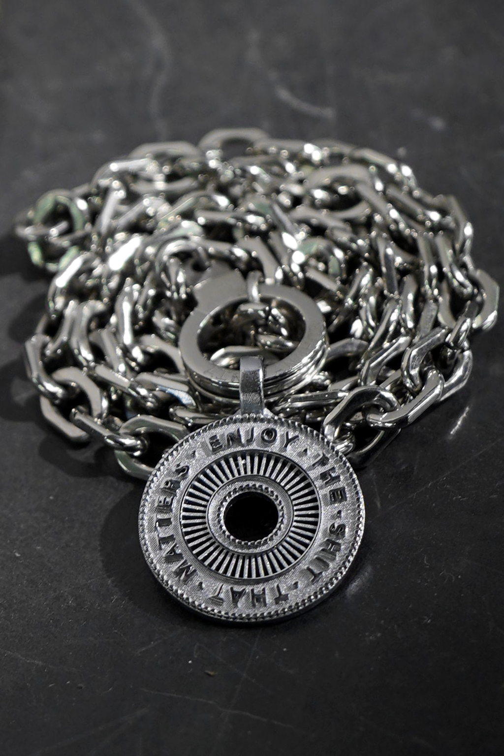 enjoy the sh*t that matters pendant
