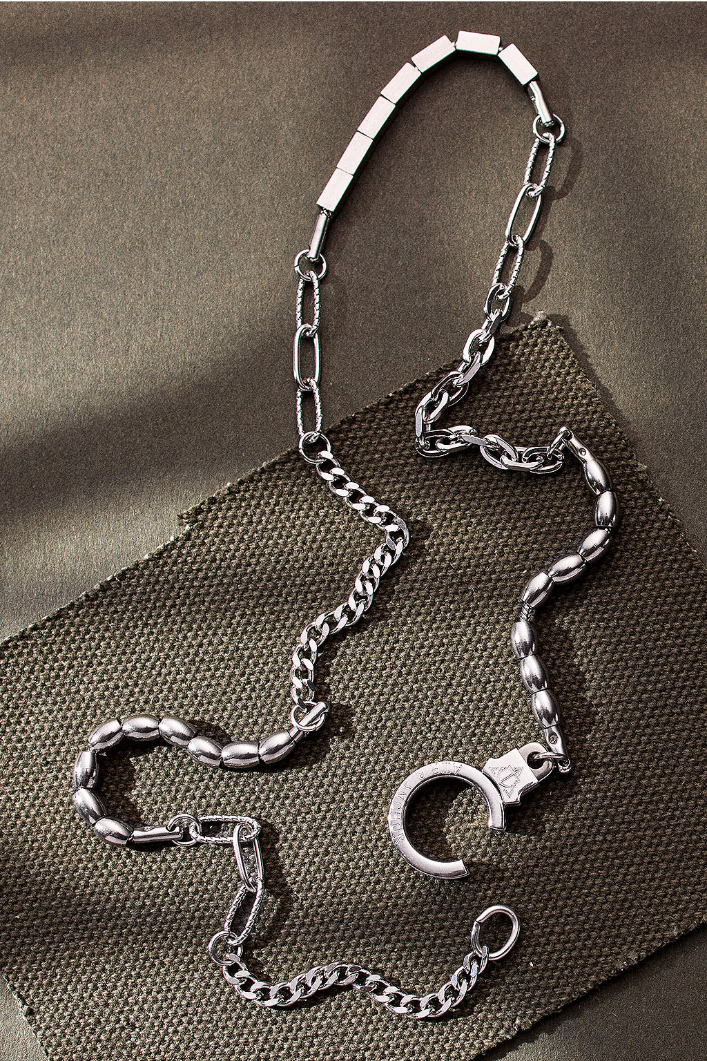 piece by piece necklace with cuff keeper